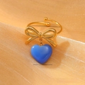 Golden bow ring with blue heart pendant showing model NMSR-G158-4 dimensions and weight - One Size / Blue