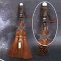 Handmade witch broom altar decor with natural crystals and a Triple Moon metal symbol - Howlite