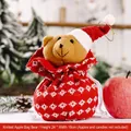 Christmas knit gift bag featuring a brown teddy bear with Santa hat and snowflake patterns - Knitted Apple Bag Bear