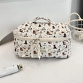 Détails de la trousse de maquillage matelassée avec oursons et double fermeture éclair - Chien skate