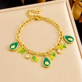 Detail of gold chain bracelet with avocado enamel charms, green beads and sparkling rhinestones - Avocado Style (B1592)
