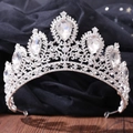 Macro shot of sparkling silver tiara with detailed pear-shaped rhinestones and alloy craftsmanship - Thick Silver White Rhinestone