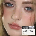 Face art tattoos with gold freckles and star patterns for festival and party makeup - Style 11