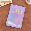 Purple holographic ziplock bag 10.5x15cm for jewelry storage on wood surface - Laser Purple
