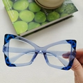 Elegant translucent blue cat-eye glasses frame with artistic swirl pattern on temples - Transparent Blue Clear Lens