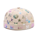 Beige canvas miki hat featuring a colorful holographic M and star pattern print - Adjustable / Off White