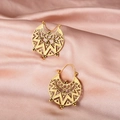 Macro shot of vintage gold hollow-carved geometric earrings on silk fabric texture - Antique Gold (4857)