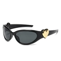 Gafas de sol Y2K ovaladas negras con un detalle de corazón dorado en la patilla - Marco Negro Lentes Grises