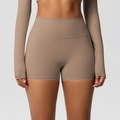 Detail of high waisted mocha yoga shorts showing matte brushed texture and elastic fit - S / Bottoms / Mocha Brown