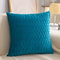 Teal pleated velvet throw pillow cover with wavy texture on a beige sofa - Light Blue