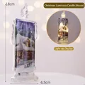 LED Christmas candle with snowy house pattern and warm yellow glow, 18cm tall decoration - House