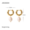 Macro shot of gold hoop earrings with teardrop pearl pendants and size dimensions - Teardrop Pearl Hoop JDE202020