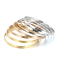 Set of six geometric titanium steel bangles in gold, rose gold and silver finishes - 69x4mm Tri-color Wave Dotted Style (KB79560-LO)