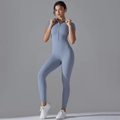 Detail of greyish-blue yoga jumpsuit with front half-zipper and high elastic fabric - S / Top And Bottom / Haze Blue