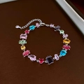 Detailed close-up of a silver chain bracelet with multi-colored teardrop and square gemstones - 3# Multicolor Bracelet