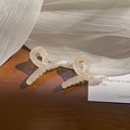 Translucent beige mini resin hair claw clips with elegant twisted design - 1 Piece / Jelly White