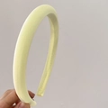 Close-up of a soft pale yellow padded sponge headband with a high-top design - Light Yellow