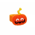 Close-up of cute orange pumpkin character ring made of soft PVC for Halloween gift - Pumpkin