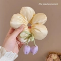 Elegant pale yellow satin flower scrunchie with purple tulip charms and green bow - Beige Flower Purple Tulip Hair Tie