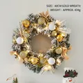 40cm snowy Christmas wreath with gold ornaments, beige bows, and warm LED lights - 40cm Gold Wreath With Lights