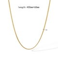 Detail view of 1.8mm golden stainless steel snake chain with 400mm plus 60mm length - Curb Chain (TN3415) / Gold