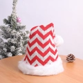 Festive red and white knitted Christmas hat with pompom on a rustic wooden table - Knitted Red and White Striped Hat (Adult)