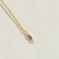 Detailed close-up of 14K gold plated dolphin pendant with blue zircons and white pearls - Royal Blue Zirconia Fish Style (XL3180-2)