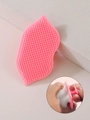 Pink leaf-shaped silicone facial cleansing brush with soft bristles and suction handle - Pink