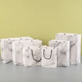 Set of six white marble pattern paper gift bags in various sizes with ribbon handles - Marble Pattern / 15*8*21 Vertical
