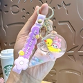 Cute pink ice cream cone keychain with Melody character and purple silicone wristband - Ice Cream