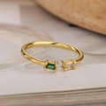 Detailed macro shot of an adjustable gold ring with emerald and white zircon baguettes - Adjustable Open / Gold with Green and White Rectangle Zirconia (13841)