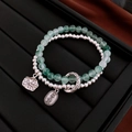 Detail von New Chinese Style doppellagiges Jade- und Silberperlenarmband mit Lotusanhänger - Silber-Lotusblatt