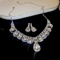 Macro shot of sparkling silver rhinestone jewelry set with necklace and drop earrings - Silver Water Drop Necklace 2pcs Set (90#)