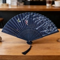 Classic dark blue folding fan with butterfly floral pattern and matching blue tassel - Dark Blue Butterfly