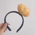 Funny black plush headband featuring a creative 3D realistic potato vegetable decoration - Potato