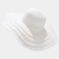 Detail of white straw sun hat featuring a 15cm wide brim and decorative fringe edges - One Size / White