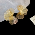Macro detail of gold-plated hollow flower earrings showing layered metallic petal textures - Large / Gold