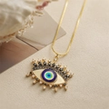 Collier pendentif œil du diable doré avec émail bleu et cristaux de zircon scintillants - Œil aux Pupilles Multicolores