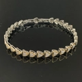 Bracciale bicolore a maglie triangolari geometriche con zirconi e chiusura a scatto - Bracciale Geometrico Triangolare Bicolore SL545