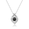 Silver projection necklace with reindeer antler design and black stone center - Small Heart Silver