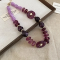 Acrylic irregular necklace in purple and dark red beads with golden metal accents - Necklace-Purple