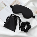 Black silk sleep set featuring padded eye mask, hair scrunchie, and drawstring storage bag - Black 3-Piece Set