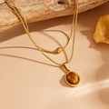 Détail du collier vintage double chaîne serpent dorée avec pendentif en pierre œil-de-chat - Oeil de Chat Rond Doré (K802)