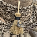 Detail of a mini wicca witch broomstick car hanging with metal pendant and natural straw - Witch Silver