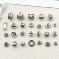Detailed assortment of antique silver charms and spacers with floral and geometric patterns - Mix 26 Styles 1pc Each/11.4g