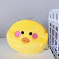 Close-up of fluffy yellow chick coin purse with embroidery details and zipper - Chicken