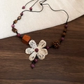 Detail of handmade beaded necklace with white flowers and purple stones on wood - Ethnic Style/Purple Wood Beads