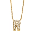 Sparkling gold necklace with letter R pendant featuring micro-pave white zircon stones - Letter R
