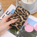 Short leopard print accordion card holder with gold zipper and leather texture - Brown