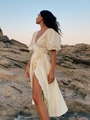 Elegant cream cotton wrap dress with puff sleeves and waist tie for a summer vacation look - M / Light Yellow